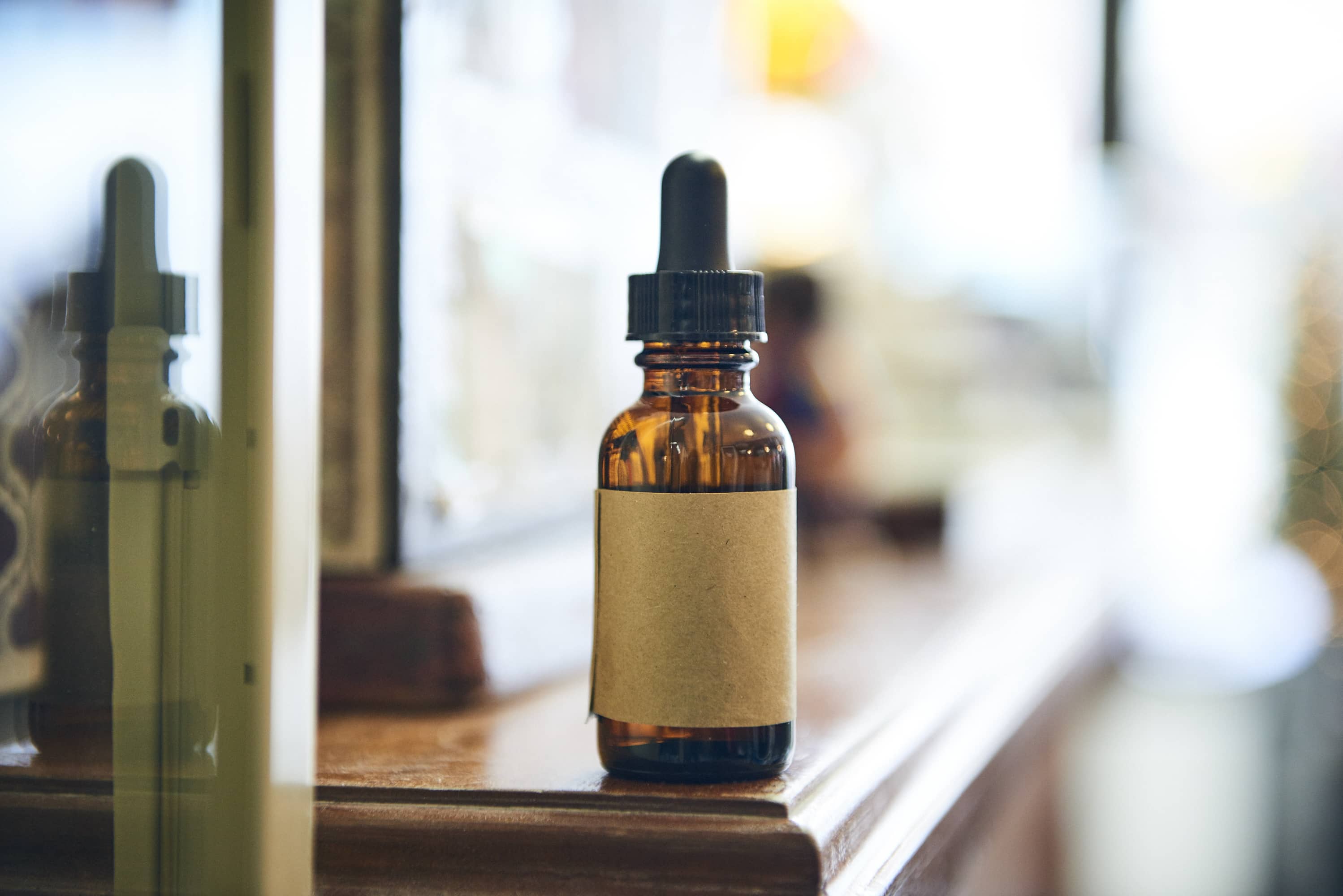 beard oil container on shelf