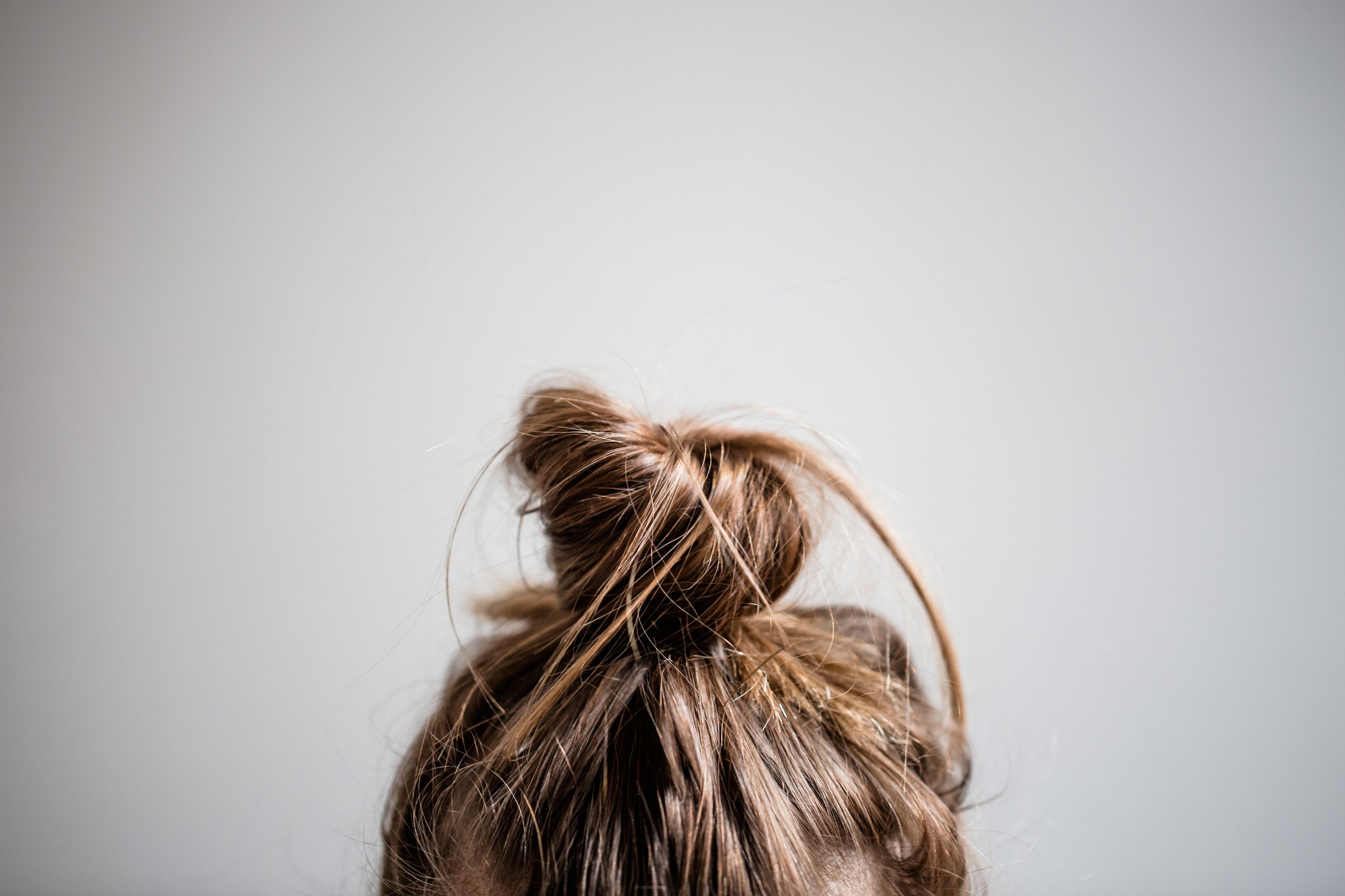 Woman's hair in a messy bun